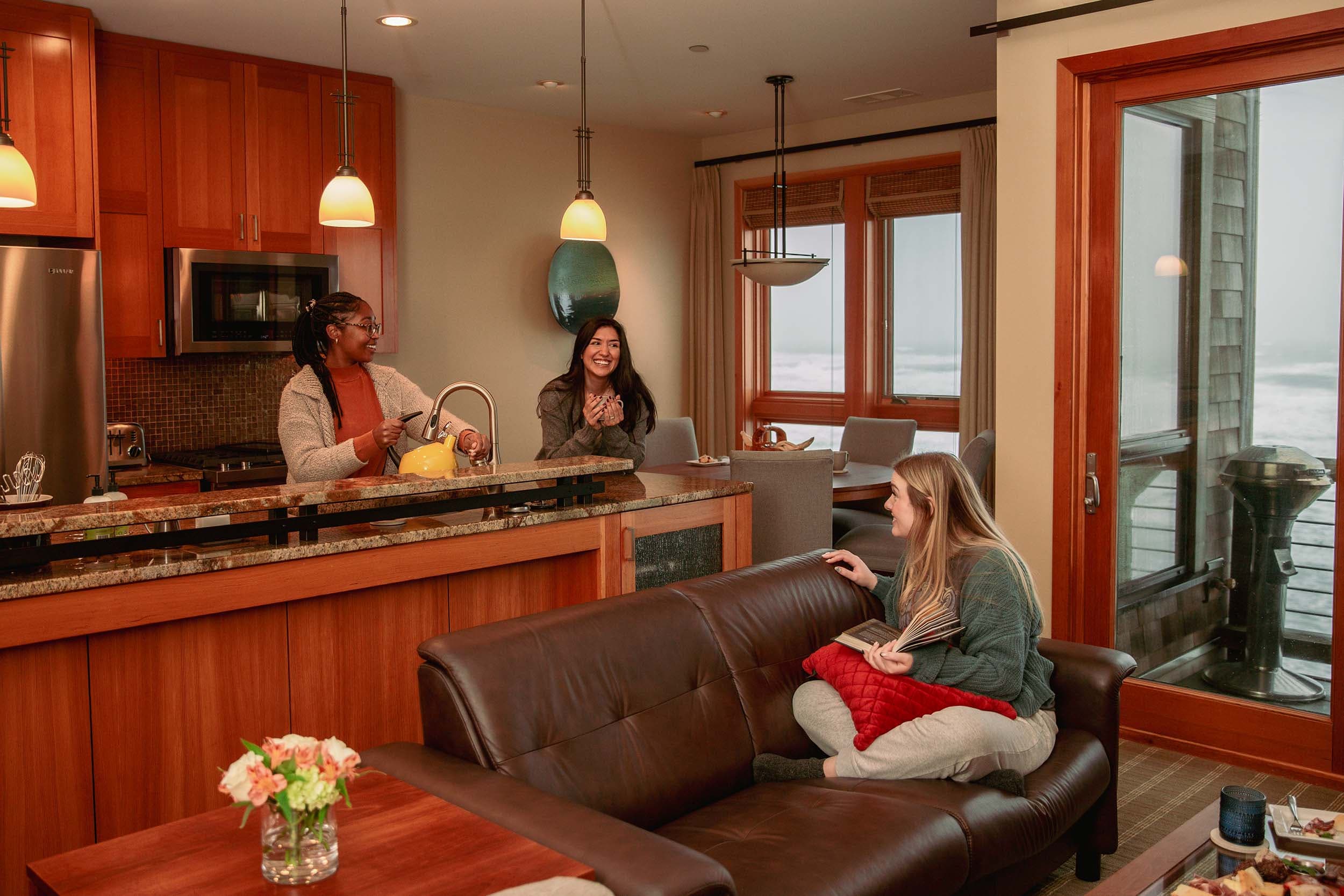 Three women hanging out in a suit at Headlands on girls weekend