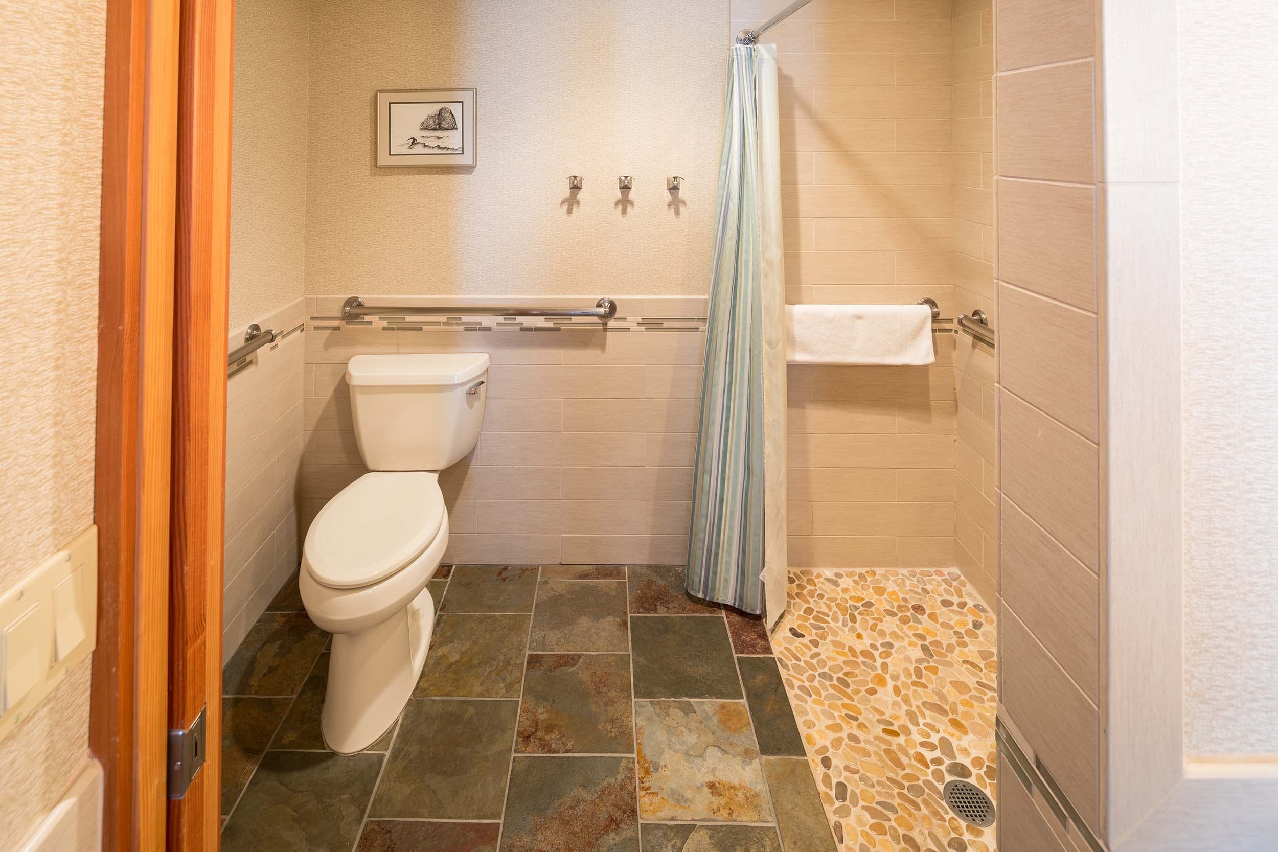 The vanity and toilet in a 2 bedroom ADA cottage at Headlands