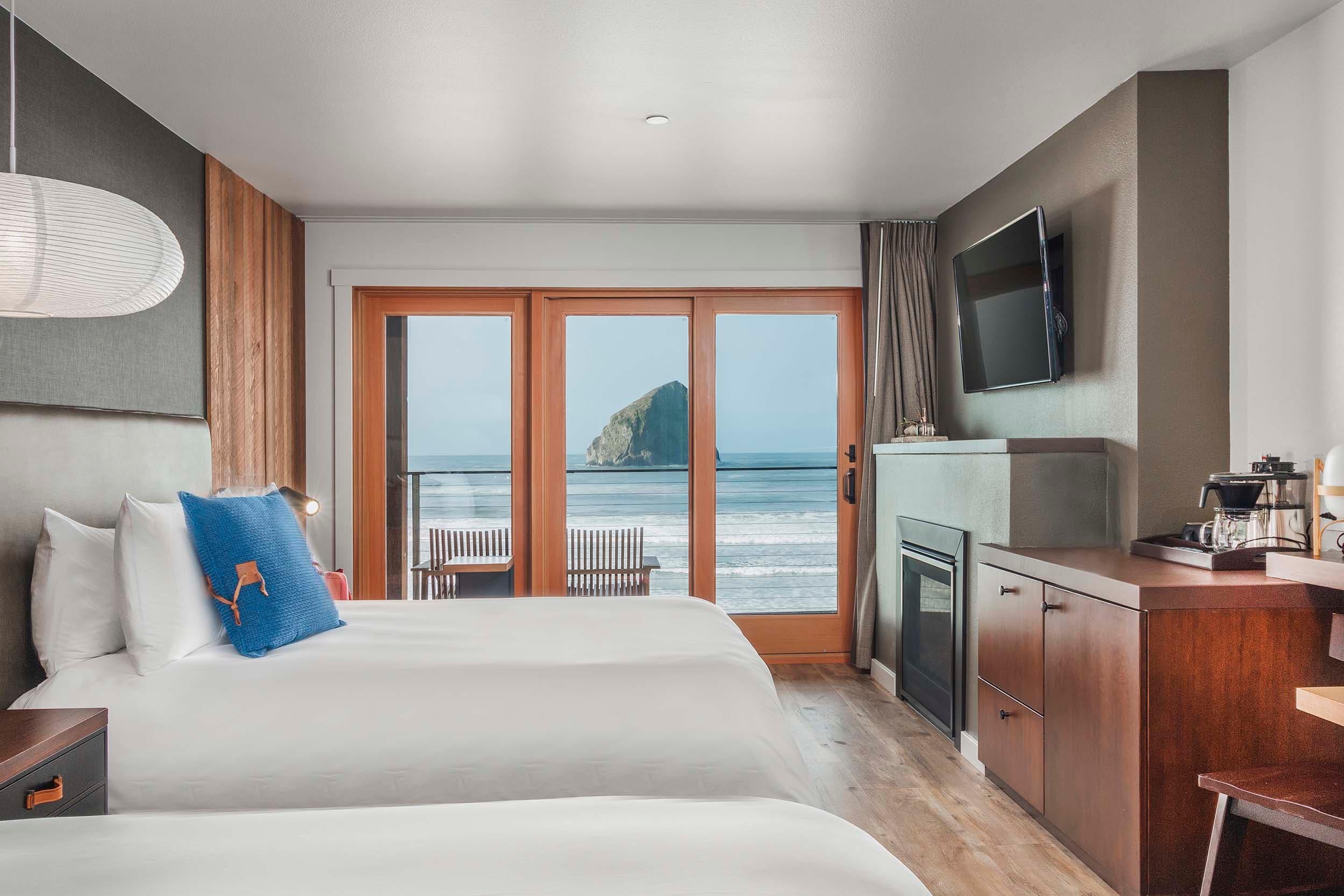 Two queen beds and gorgeous views of the ocean in a Two Queens Signature room at Headlands