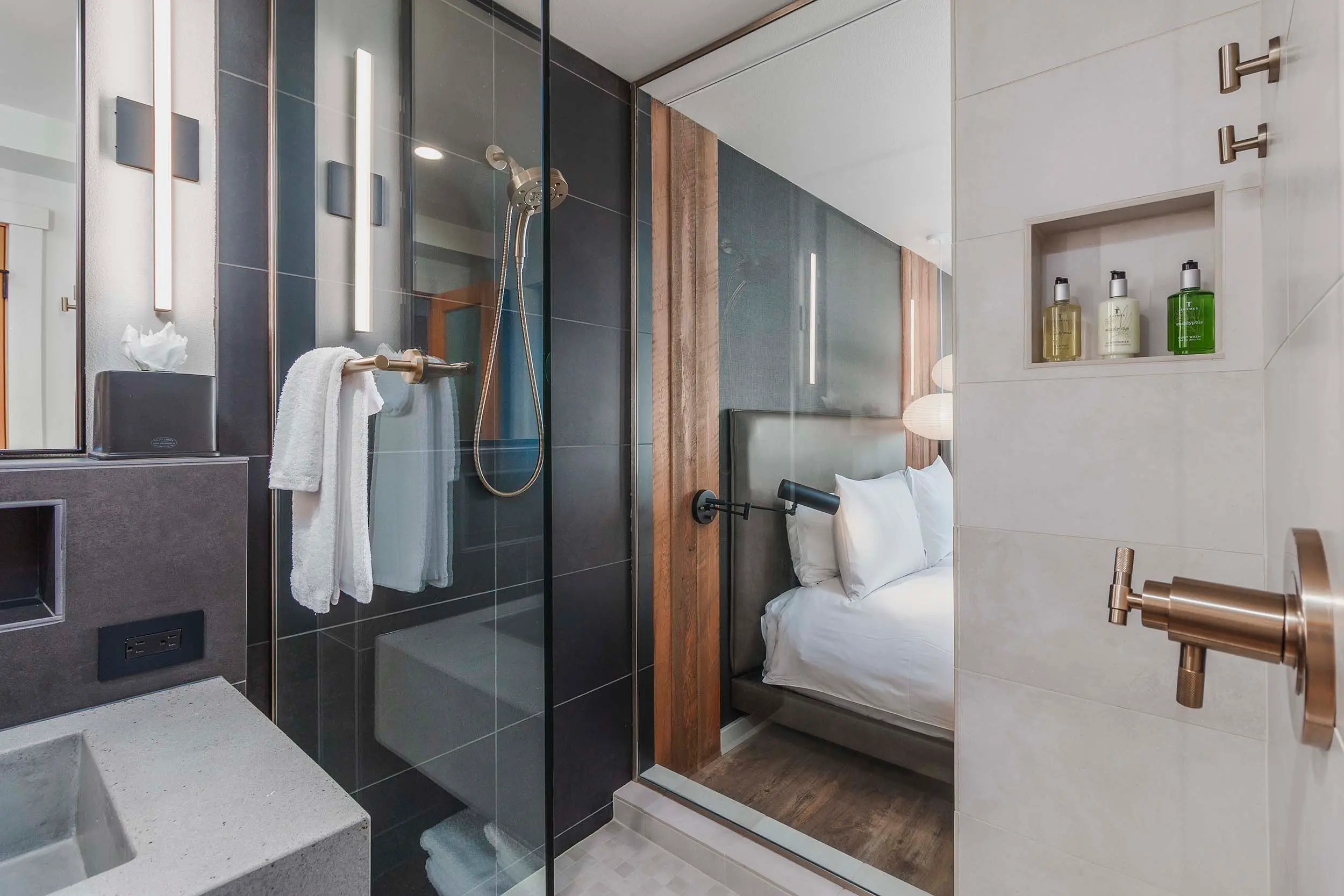A modern shower in a Two Queens Signature room at Headlands