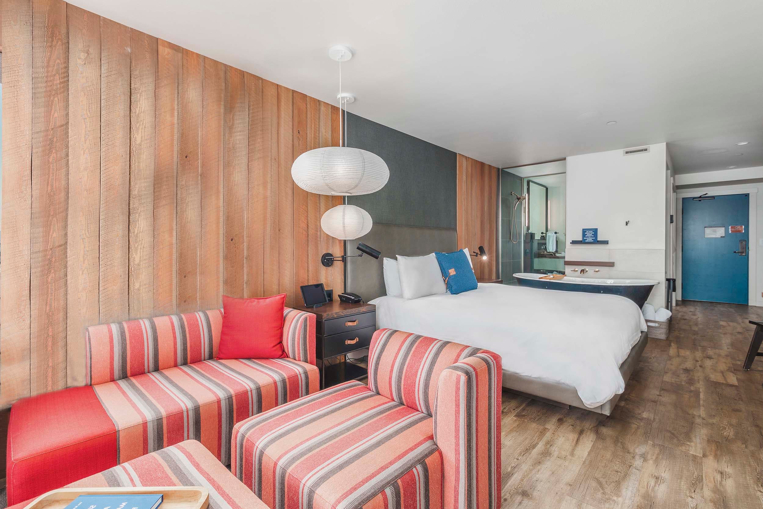 The open concept King Signature room in the Oceanfront lodge at Headlands