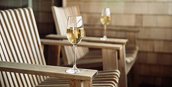 Oceanfront balcony with sparkling wine